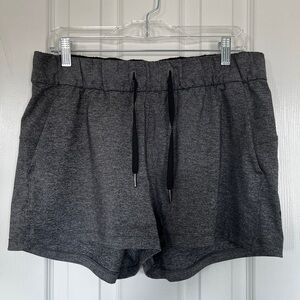 Lululemon On The Fly shorts. Size 10 in charcoal gray.